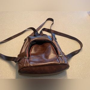 Vegan leather backpack purse. Purchased from local boutique. Used for 2 weeks